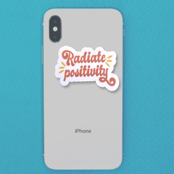 "Radiate Positivity" Vinyl Die cut Decal Sticker On Back Of Phone